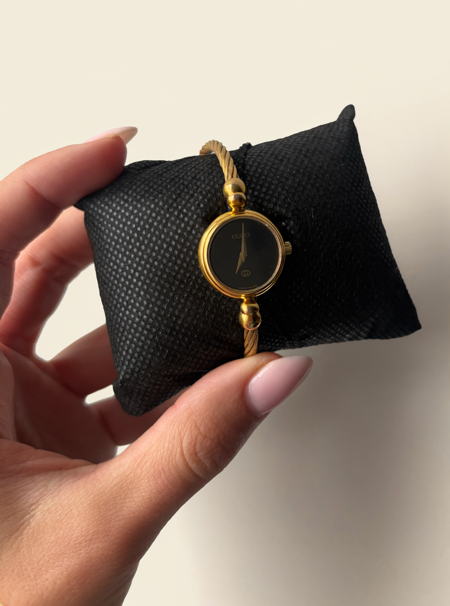 Gucci 2700L Gold Bangle Watch with Black Mother of Pearl Face