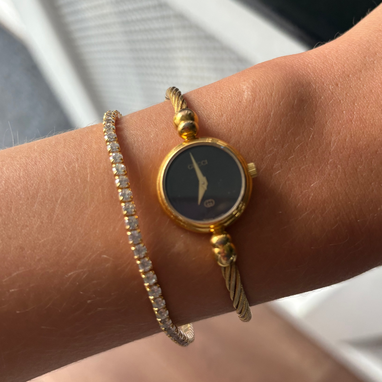Gucci 2700L Gold Bangle Watch with Black Mother of Pearl Face